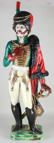 Very old Majolica hussar with polychrome and gold