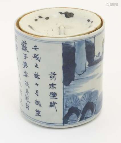 A 19thC Chinese blue and white lidded pot / biscuit barrel decorated with Chinese script and a