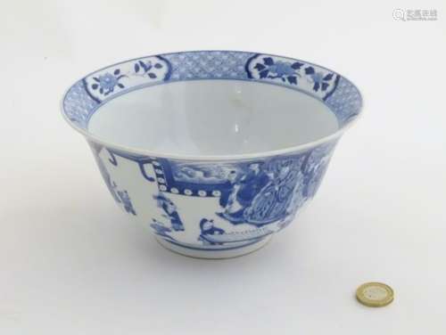 A Chinese blue and white footed bowl with a flared rim,