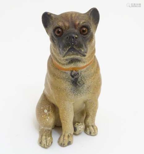 A 19thC painted terracotta model of a seated dog with glass inset eyes. Approx. 4 1/2