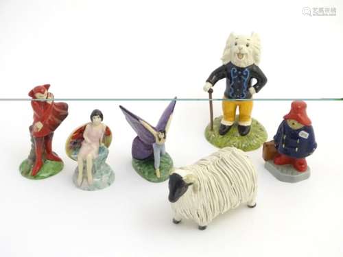 A quantity of assorted ceramic figurines, to include a Carlton Ware fairy and 'Mephisto' figure,