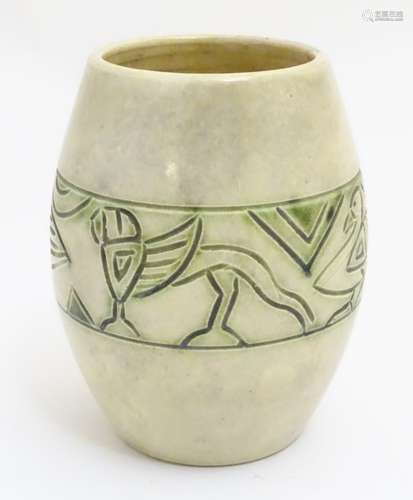 A Radford pottery barrel vase decorated with incised banded decoration depicting stylised birds and