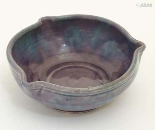 A Baron Barnstable studio pottery dish / bowl with a mottled purple and blue glaze and three spout