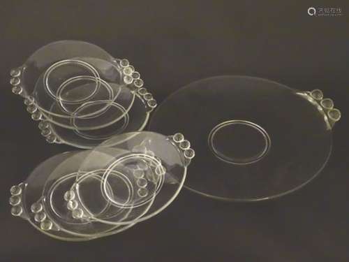 An Art Deco glass fruit / cake set comprising large serving plate and 6 smaller plates with