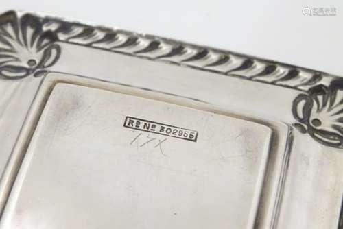 A silver pin dish of squared form hallmarked Sheffield 1899 maker W Harrison & Co.