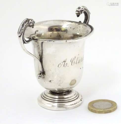 A silver twin handled trophy cup hallmarked London 1926 maker Robert Pringle & Son. 3