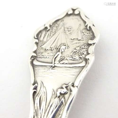 An American silver souvenir spoon titled 'Oklahoma ' titled to handle with ' Great Seal of the