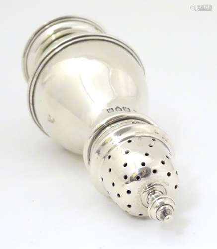 A silver sugar shaker / caster / muffineer hallmarked London 1908 maker Wakely & Wheeler.