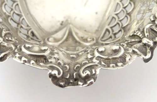 A silver bon bon dish hallmarked Chester 1897 maker Daniel George Collins.