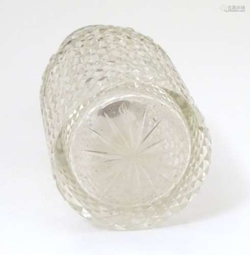 A hobnail cut glass scent / perfume bottle with silver mount and lid.