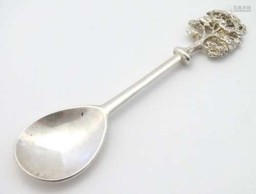 A John Cussell Woodland Trust silver spoon, hallmarked London 1997,