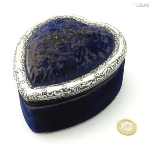 A large velvet covered dressing table box of heart shape with silver surround hallmarked Birmingham