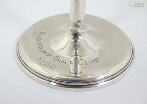 A Victorian silver cup with embossed decoration and engraved 'Rushcliff Gold Club 1938'