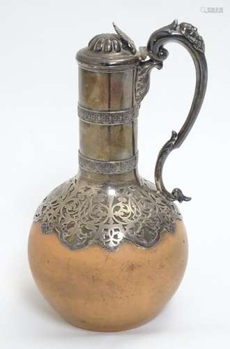 A Victorian wine flagon / ewer / claret jug the ceramic body of terracotta colour marked under