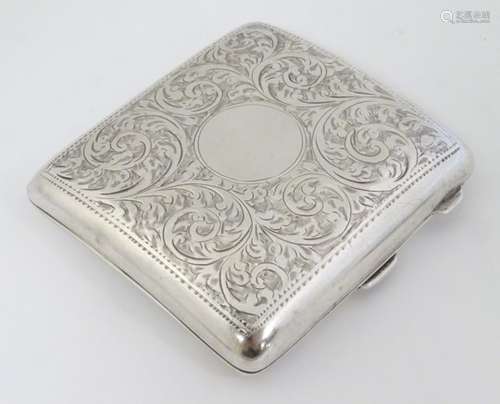 A silver cigarette case. Hallmarked Birmingham 1918 maker William Neale & Son Ltd.