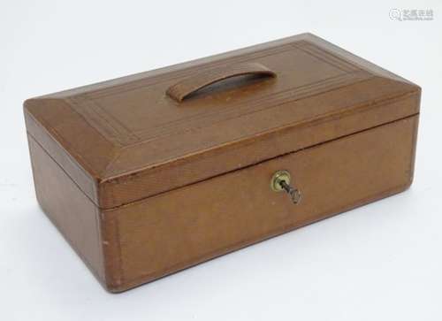 A 19thC Wells and Lambe box with embossed leather finish and a loop handle.