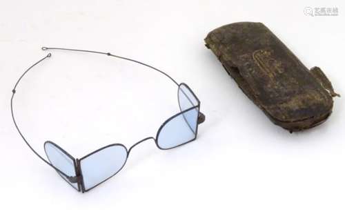 A cased pair of late Victorian D-spectacles, also known as railway spectacles / glasses,