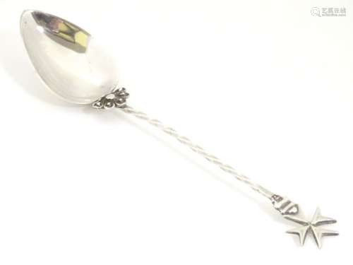 A Maltese silver spoon with twist handle surmounted by Maltese Cross finial 7