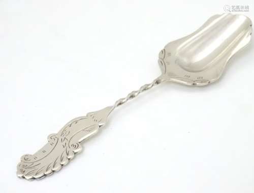 A Continental white metal spoon marked Sola 5” long CONDITION: Please Note - we