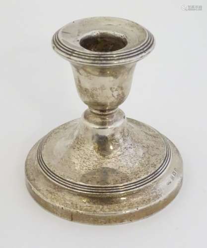 A silver candlestick hallmarked Birmingham 1921 maker Sanders & Mckenzie 4