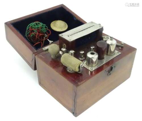 A mahogany cased Ever-Ready Electric Coil, model no.