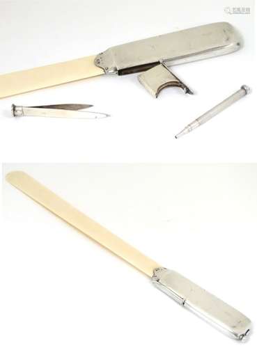 An unusual silver handled ivory page turner / paper knife with silver handle having stamp section