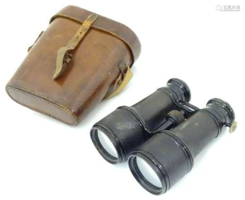 A pair of early-20thC cased binoculars, having adjustable focus marked 'Field Marine Theatre',