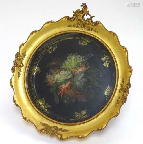 A 19thC circular tole peint tray, the centre painted with fern,