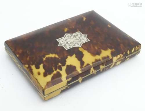 An unusual 19thC blond tortoiseshell travelling card case with an engraved cartouche to top and