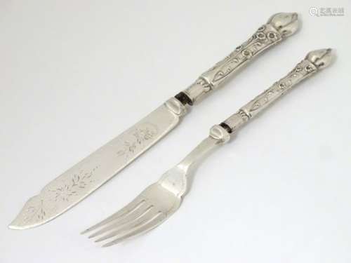 A silver handled fish knife and fork hallmarked Birmingham 1906 CONDITION: Please