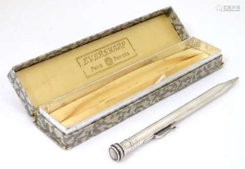 A Eversharp silver propelling pencil. Contained within original box. Approx.