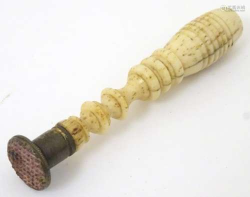 A 19thC seal / tamper with a turned bone handle. Approx. 2 7/8