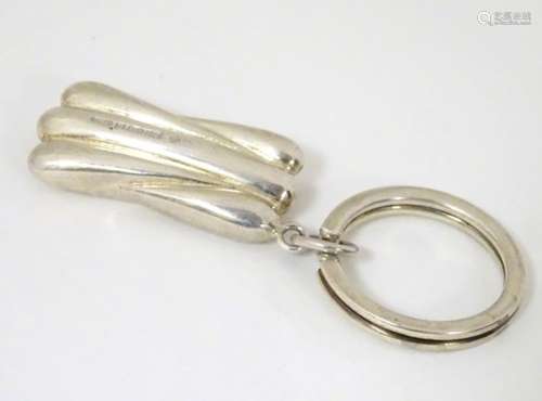 A silver key ring hallmarked Sheffield 1999 maker CCP.