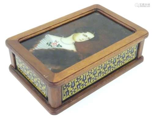 A mid-century jewellery box with an overpainted print of a woman in pearls and a fur collar to top.