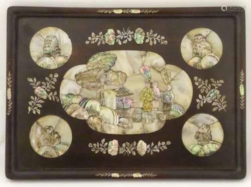 A Chinese hardwood tray with inset mother of pearl and penwork decoration depicting oriental