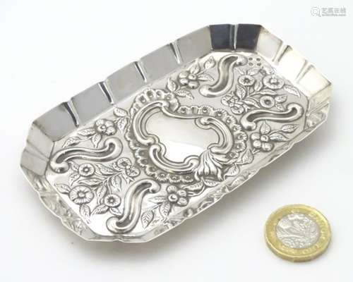 A silver pin tray with embossed decoration Hallmarked London 1890 maker William Comyns 4 1/2