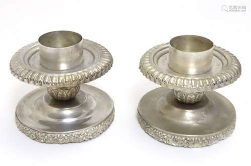 A pair of large candle holders, nickel plated with acanthus decoration. Approx.