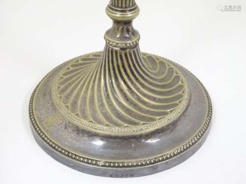 A silver plate candlestick 12