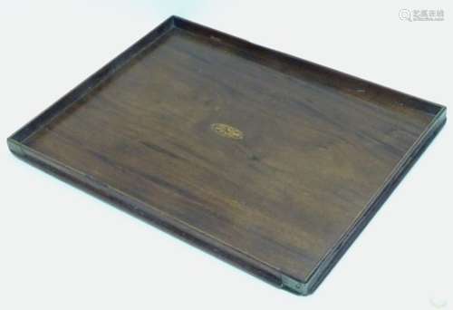 A Georgian mahogany tray having shell inlay to the centre and boxwood stringing to the raised edges,