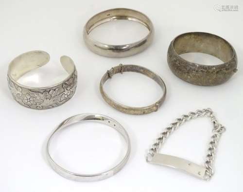 6 assorted silver and white metal bracelets many of bangle form