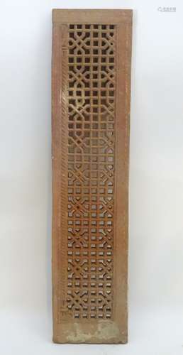 Garden and Architectural: A terracotta panel of rectangular form with pierced Persian style