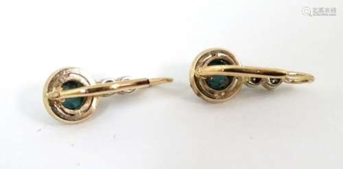 14ct gold earrings set with turquoise cabochon and diamonds CONDITION: Please Note -