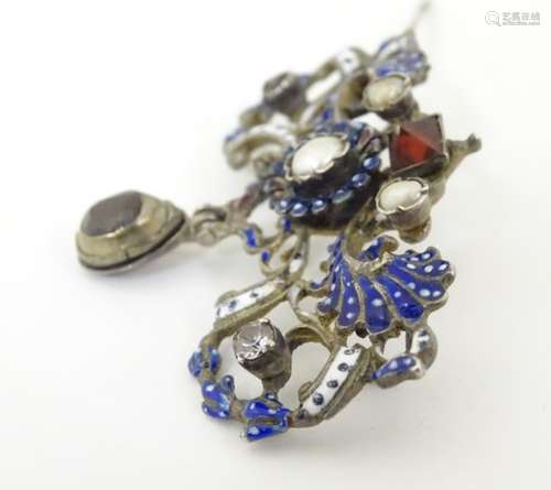 A late 19thC / early 20thC Baroque brooch set with garnet drop, blister pearls,