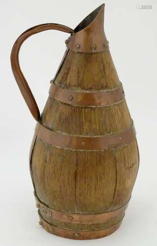 A French style oak cider barrel coopered in copper, with a copper spout and handle. Approx.