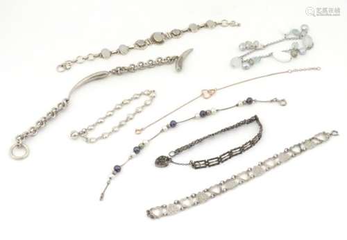 Assorted bracelets including a silver gilt bracelet with heart decoration,