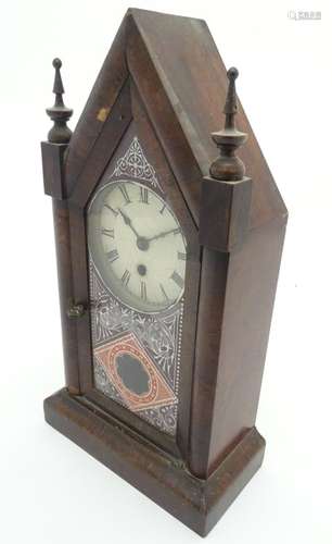 Lancet Mantel Clock: An Ansonia Clock Company walnut cased 30hr clock, with 4 1/4