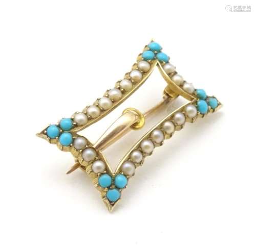 A late 19thC / early 20thC 15ct gold buckle formed brooch set with turquoise and seed pearl.