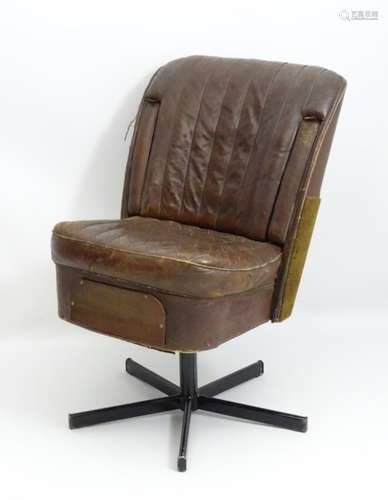 A mid / late 20thC leather car seat converted into a swivel office chair.