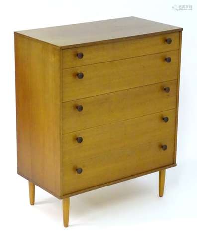 Vintage Retro: a British Avalon 5 drawer chest of drawers on short shaped legs, labelled.