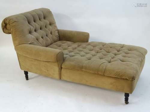 A late 20thC daybed / chaise lounge with deep buttoned upholstery,